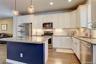 12882 E Caspian Pl in Aurora, CO - Building Photo - Building Photo