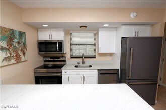 1023 Anglers Cove in Marco Island, FL - Building Photo - Building Photo