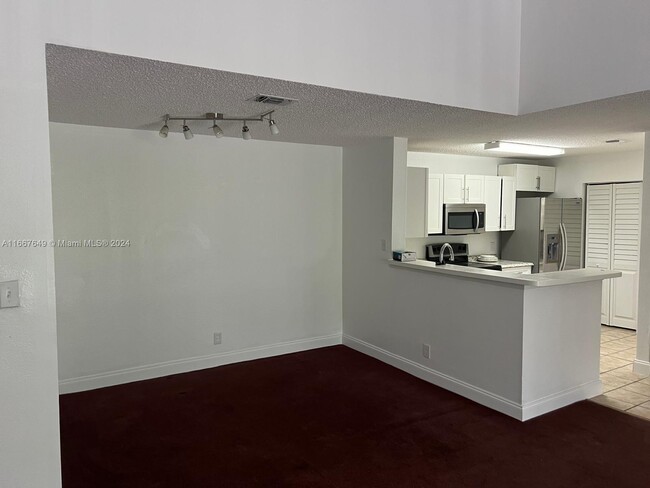 11295 W Atlantic Blvd in Coral Springs, FL - Building Photo - Building Photo