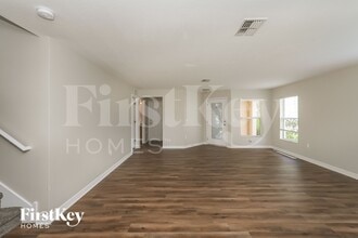 18828 Parapet Pl, Unit B210 in Land O Lakes, FL - Foto de edificio - Building Photo