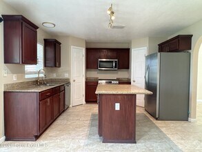 1718 Sawgrass Dr SW in Palm Bay, FL - Building Photo - Building Photo