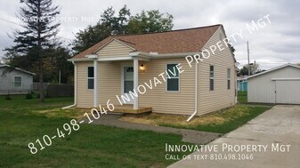 2128 S Dye Rd in Flint, MI - Building Photo