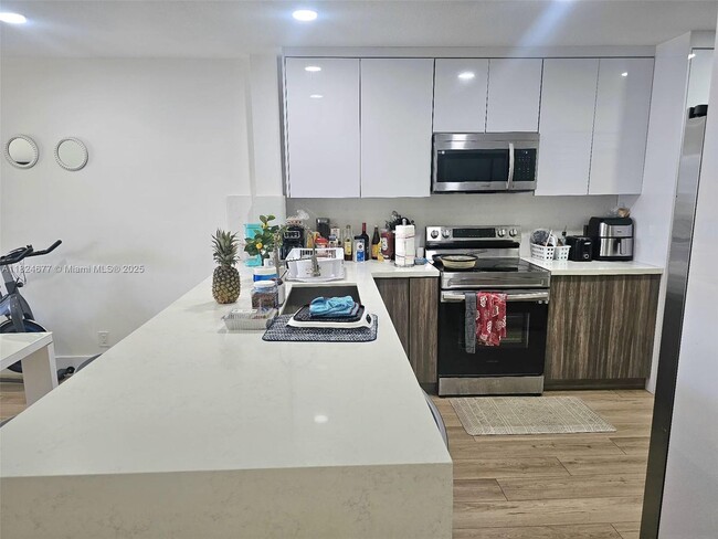 property at 7355 Woodmont Terrace