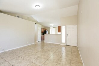 9048 W Chanute Pass in Phoenix, AZ - Building Photo - Building Photo