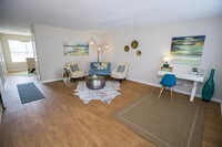 Spacious living area perfect for entertaining or enjoying a quiet night in with family! - The Legends at Lake Murray Apartments in Columbia, South Carolina