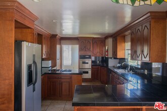 8300 Regis Way in Los Angeles, CA - Building Photo - Building Photo