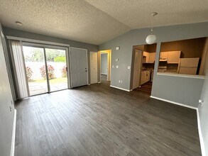 1495 Malibu Cir NE-Unit -APT 107 in Palm Bay, FL - Building Photo - Building Photo