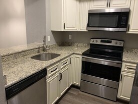 1548 SE Royal Green Cir, Unit 105 in Port St. Lucie, FL - Building Photo