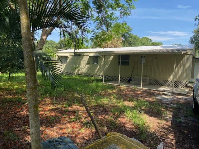 1255 SW Tropical Terrace in Stuart, FL - Building Photo - Building Photo