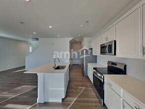 13802 E 100th Dr in Commerce City, CO - Building Photo - Building Photo