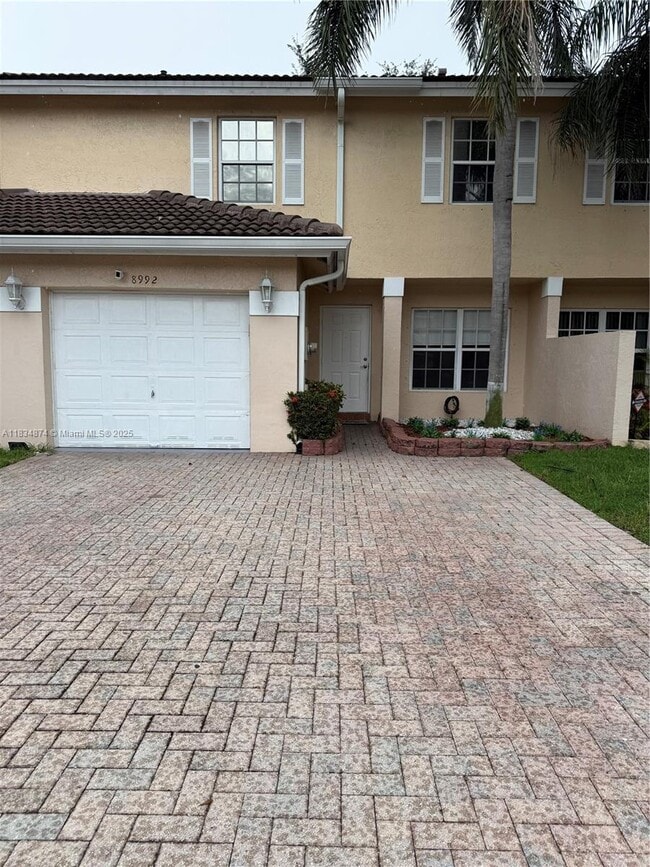 property at 8992 NW 53rd St