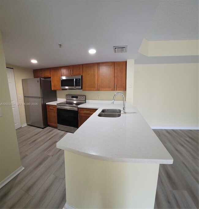 5051 Wiles Rd in Coconut Creek, FL - Building Photo - Building Photo