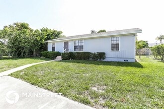 7303 Thatcher Ave in Lantana, FL - Building Photo - Building Photo