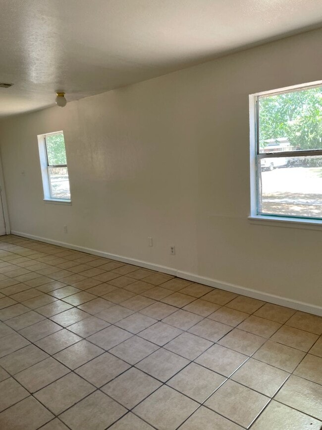 property at 703 E 3rd St