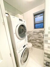 Mott Street, Unit 017 in New York, NY - Building Photo - Building Photo