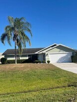 1775 SW Brisbane St in Port St. Lucie, FL - Building Photo