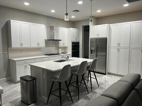 15558 Goldfinch Cir in Westlake, FL - Building Photo - Building Photo