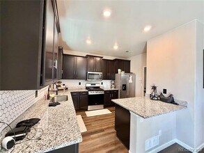 8940 Uravan St in Commerce City, CO - Building Photo - Building Photo