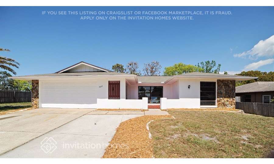7023 Bramblewood Dr in Port Richey, FL - Building Photo