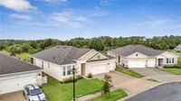 6967 Audobon Osprey Cv in Harmony, FL - Foto de edificio - Building Photo