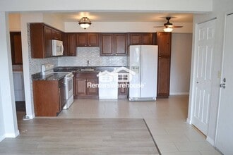 5995 W Hampden Ave in Denver, CO - Building Photo - Building Photo