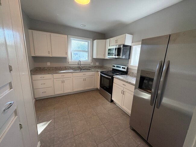 38 Lisbon St in Rochester, NY - Foto de edificio - Building Photo