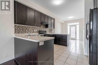 7248 Triumph Ln in Mississauga, ON - Building Photo - Building Photo