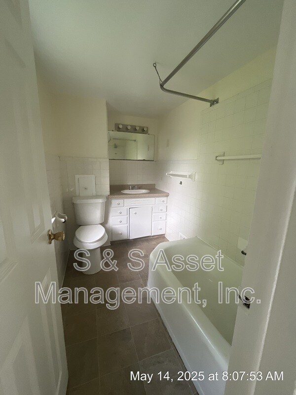 717 N Sycamore St in Lansing, MI - Building Photo - Building Photo