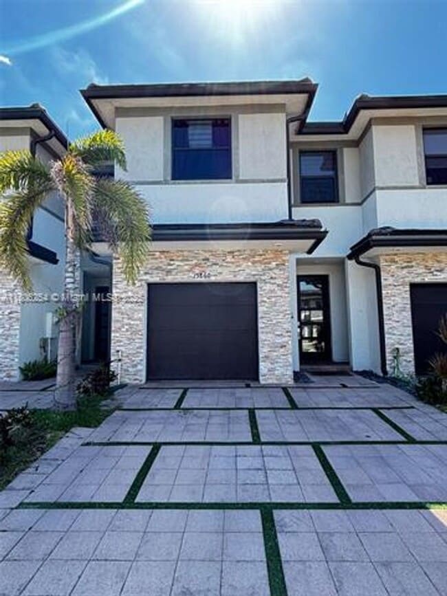 property at 15860 NW 91st Ct
