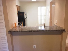 1040 Lake Shore Dr-Unit -102 in Lake Park, FL - Building Photo - Building Photo