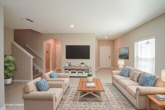 7224 Spring Snowflake Ave in Palm River-Clair Mel, FL - Building Photo - Building Photo