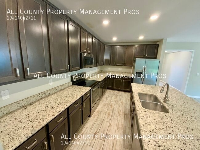 15293 Mille Fiore Blvd in Port Charlotte, FL - Building Photo - Building Photo