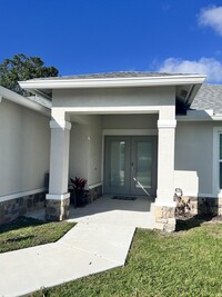 1541 SW Urbino Ave in Port St. Lucie, FL - Building Photo - Building Photo