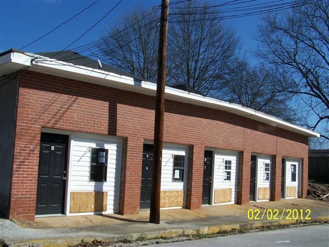 209-219 Buchanan St in Bremen, GA - Foto de edificio - Building Photo