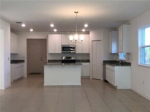 15514 Gemini Dr in Mascotte, FL - Building Photo - Building Photo