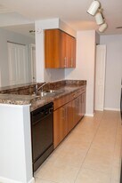 5820 W Sample Rd, Unit Poinciana 2-105 in Coral Springs, FL - Building Photo