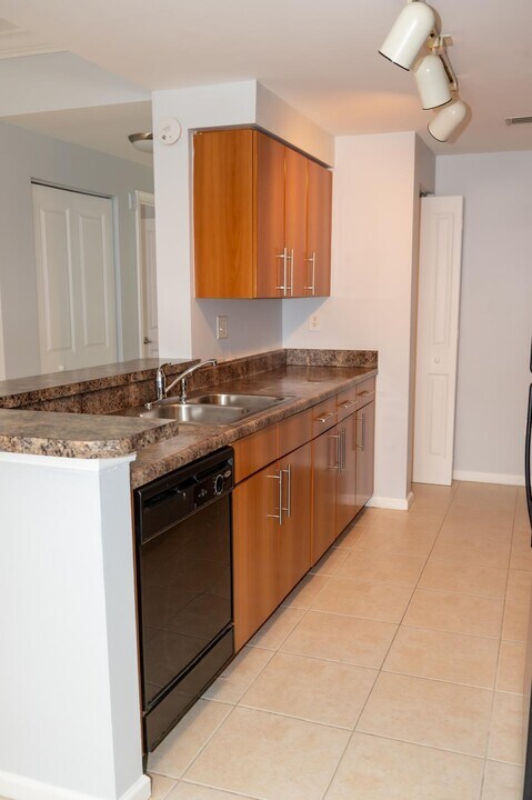 5820 W Sample Rd, Unit Poinciana 2-105 in Coral Springs, FL - Building Photo