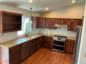 5013 E Mossberg Cir in Post Falls, ID - Building Photo - Building Photo
