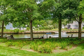 27 W Tiana Rd in Hampton Bays, NY - Building Photo - Building Photo