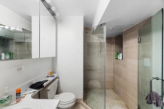 220 Sullivan St, Unit 1A in New York, NY - Building Photo - Building Photo