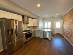 124 S Highland Ave in Baltimore, MD - Foto de edificio - Building Photo
