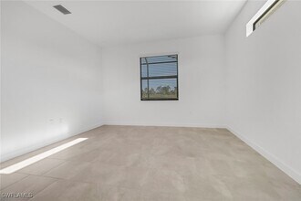 19596 Hinkley Dr in Estero, FL - Building Photo - Building Photo