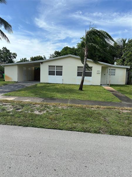 property at 6231 NW 13th St