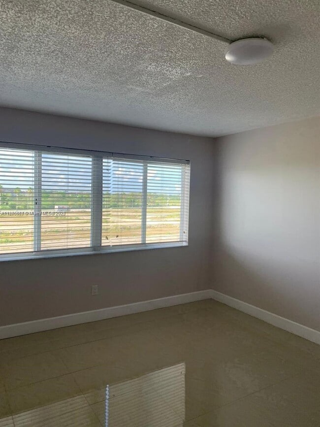 property at 14830 Naranja Lakes Blvd