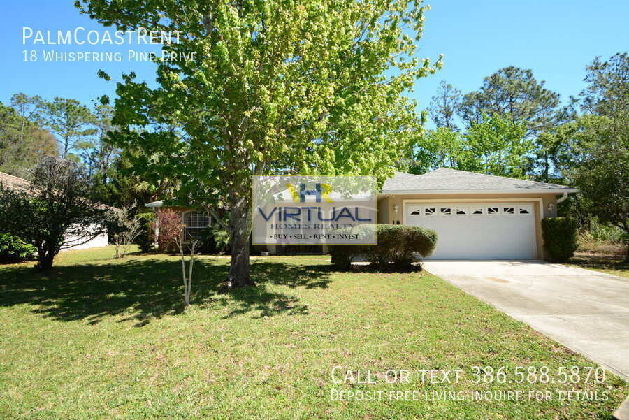 18 Whispering Pine Dr in Palm Coast, FL - Building Photo