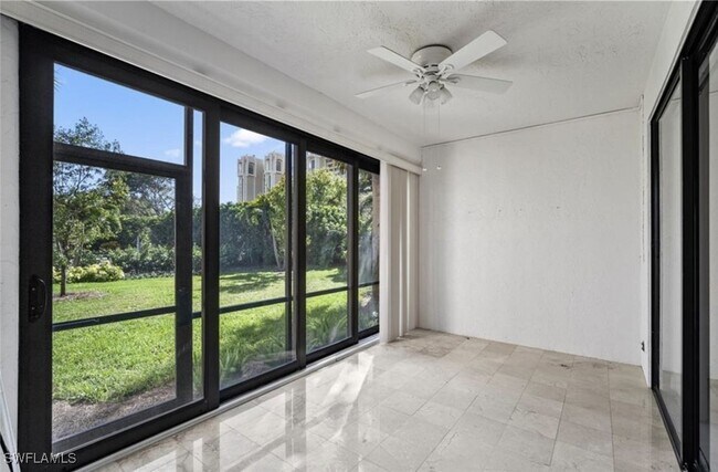 property at 7056 Pelican Bay Blvd