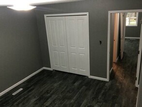 1002 Graceland Ave in Perry, IA - Foto de edificio - Building Photo