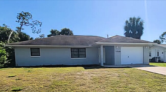 15239 Chamberlain Blvd in Port Charlotte, FL - Building Photo - Building Photo