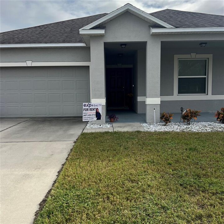 167 Cambria Grove Cir in Davenport, FL - Foto de edificio