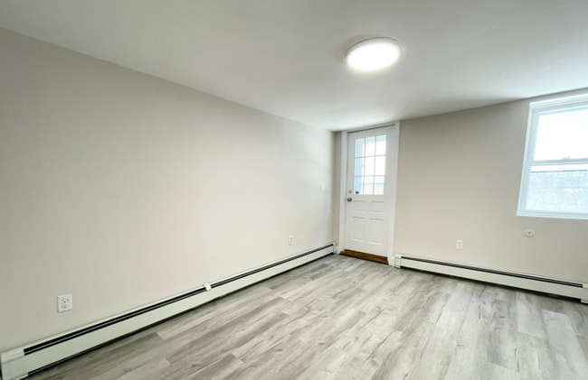 174 Bolton St, Unit 1 in Boston, MA - Foto de edificio - Building Photo